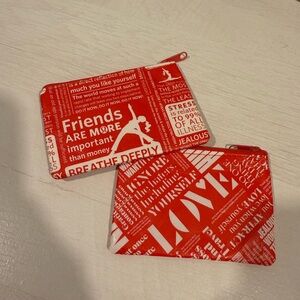 Two lululemon coin pouches